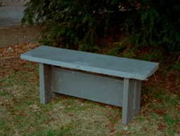 Bluestone bench with hand carving