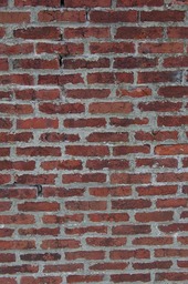 Brick previously repaired with portland cement mortar