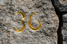 hand carved numbers with 24K gold leaf