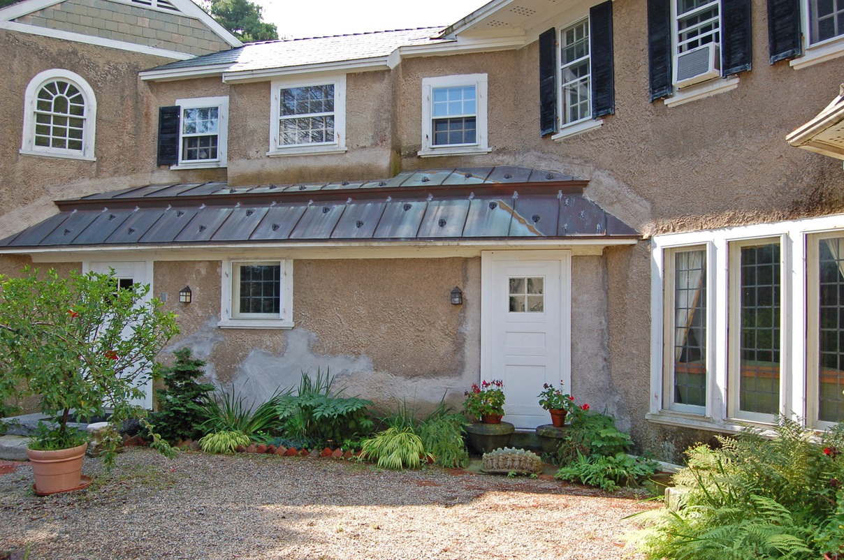 Previous repairs with Portland cement mortar | Improper materials and finish texture  