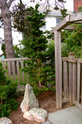 Stone accent in garden bed